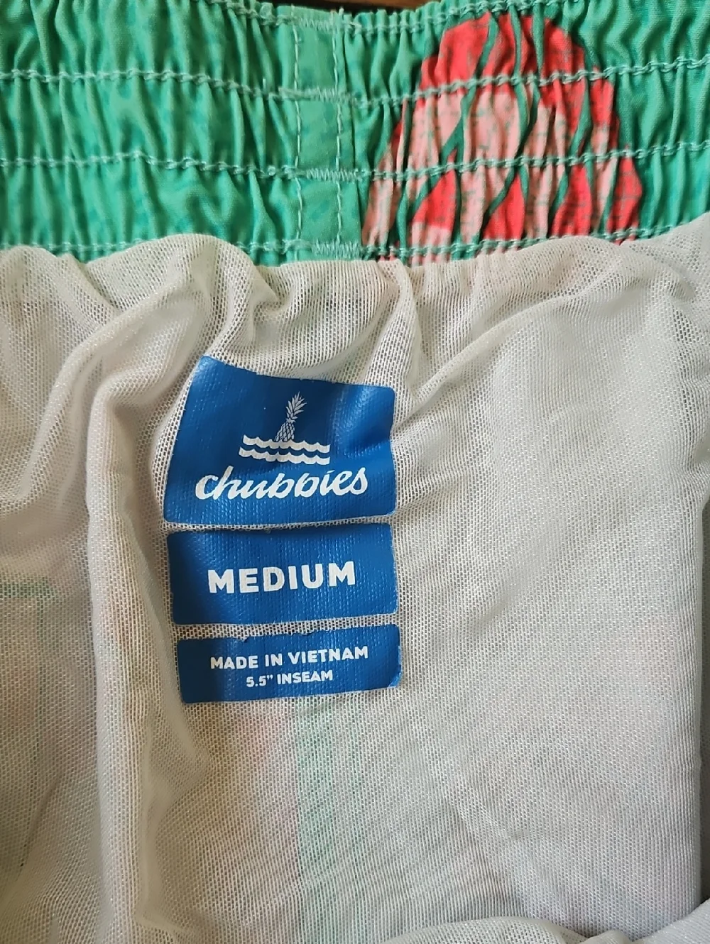 chubbies Turquoise Swim Shorts‎ with Coral Pineapples Medium